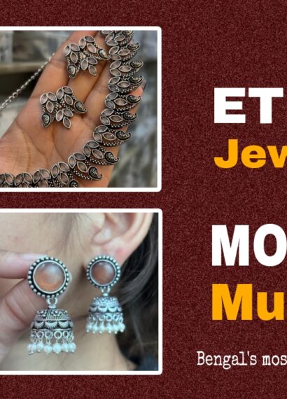 Two pairs of jhumkas and two oxidised necklace sets displayed elegantly, showcasing ethnic jewellery for versatile occasions.